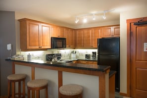 Condo, 2 Bedrooms | Private kitchen | Fridge, oven, coffee/tea maker, toaster - 1201 - Two Bedroom Standard Eagle Springs West 2 Condo by RedAwning (Solitude)