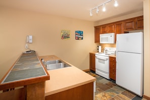 Condo, 1 Bedroom | Private kitchen | Fridge, oven, coffee/tea maker, toaster - 3216 - One Bedroom + Den Standard Powderhorn Lodge 1 Condo by RedAwning (Salt Lake City)