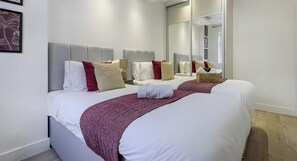 1 habitación, tabla de planchar con plancha, wifi y ropa de cama 