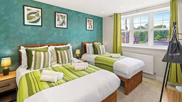 4 habitaciones, tabla de planchar con plancha, wifi y ropa de cama