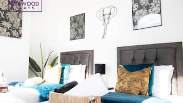 1 slaapkamer, een strijkplank/strijkijzer, wifi, beddengoed