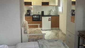 Bureau, fer et planche Ă repasser, lit parapluie, Wi-Fi gratuit