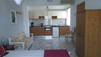 1 bedroom, desk, iron/ironing board, travel cot