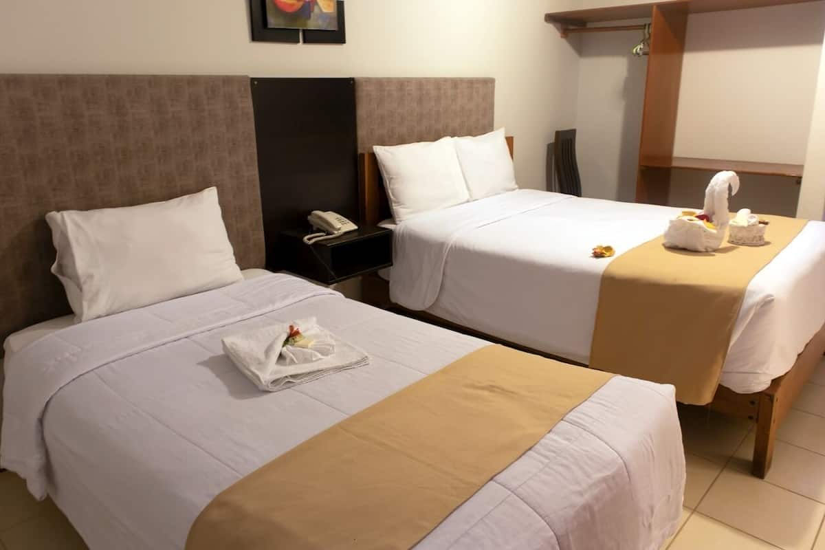 Basic Double Room, 2 Single Beds | Individually decorated, iron/ironing board, free WiFi, bed sheets