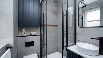 Shower, hair dryer, towels, soap