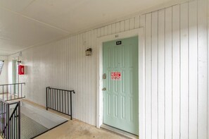 A door with a "NO SMOKING" sign, a fire extinguisher, and a number "B-6" above it. - A bedroom in close proximity to Fort Sill! (Lawton)