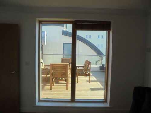 Millgrove House, Penthouse Apartment sun terrace with stunning sea view