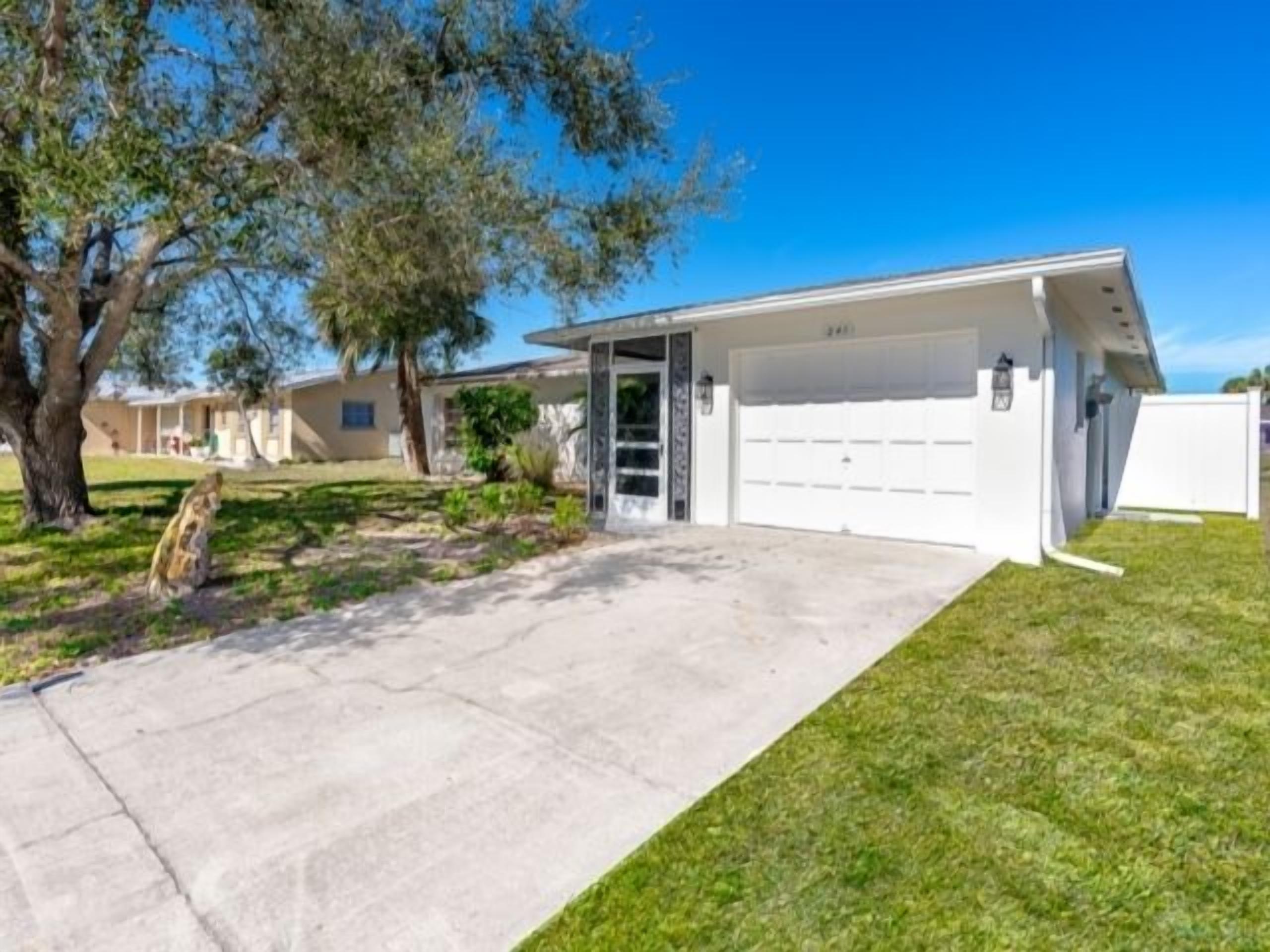 Introducing Caddy Shack,the perfect abode for your short-term stay. This delightful 2 bed, 2 bath canal home has been thoughtfully remodeled to exude a beachy atmosphere