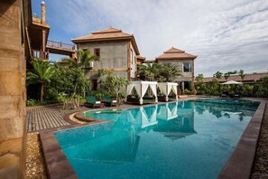 In-room safe, desk, laptop workspace, blackout drapes - Model Temple Resort & Spa (Siem Reap)