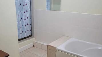Shower, towels, soap, shampoo