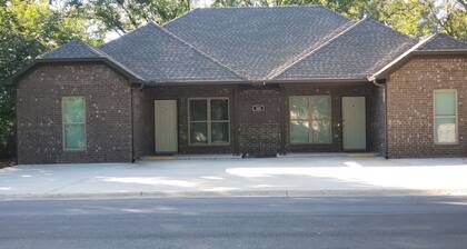 Unit A- A charming 3-bedroom, 2-bathroom duplex offering a cozy atmosphere.