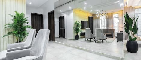 Premium Apartment | Living area | 50-inch Smart TV with cable channels
