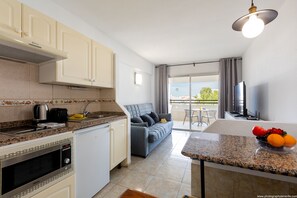 Fridge, microwave, electric kettle, toaster