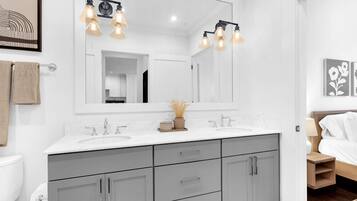 Shower, eco-friendly toiletries, hair dryer, towels