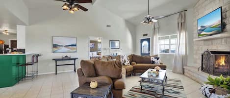 Smart TV, fireplace, books