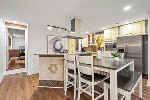 Fridge, microwave, oven, stovetop - Fine View | Rooftop Deck | 4BR (Pittsburgh)