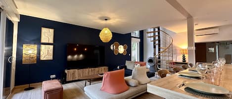 Smart TV, fireplace, books
