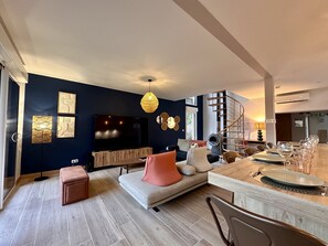 Smart TV, fireplace, books