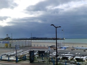 On the beach, sun loungers, beach towels