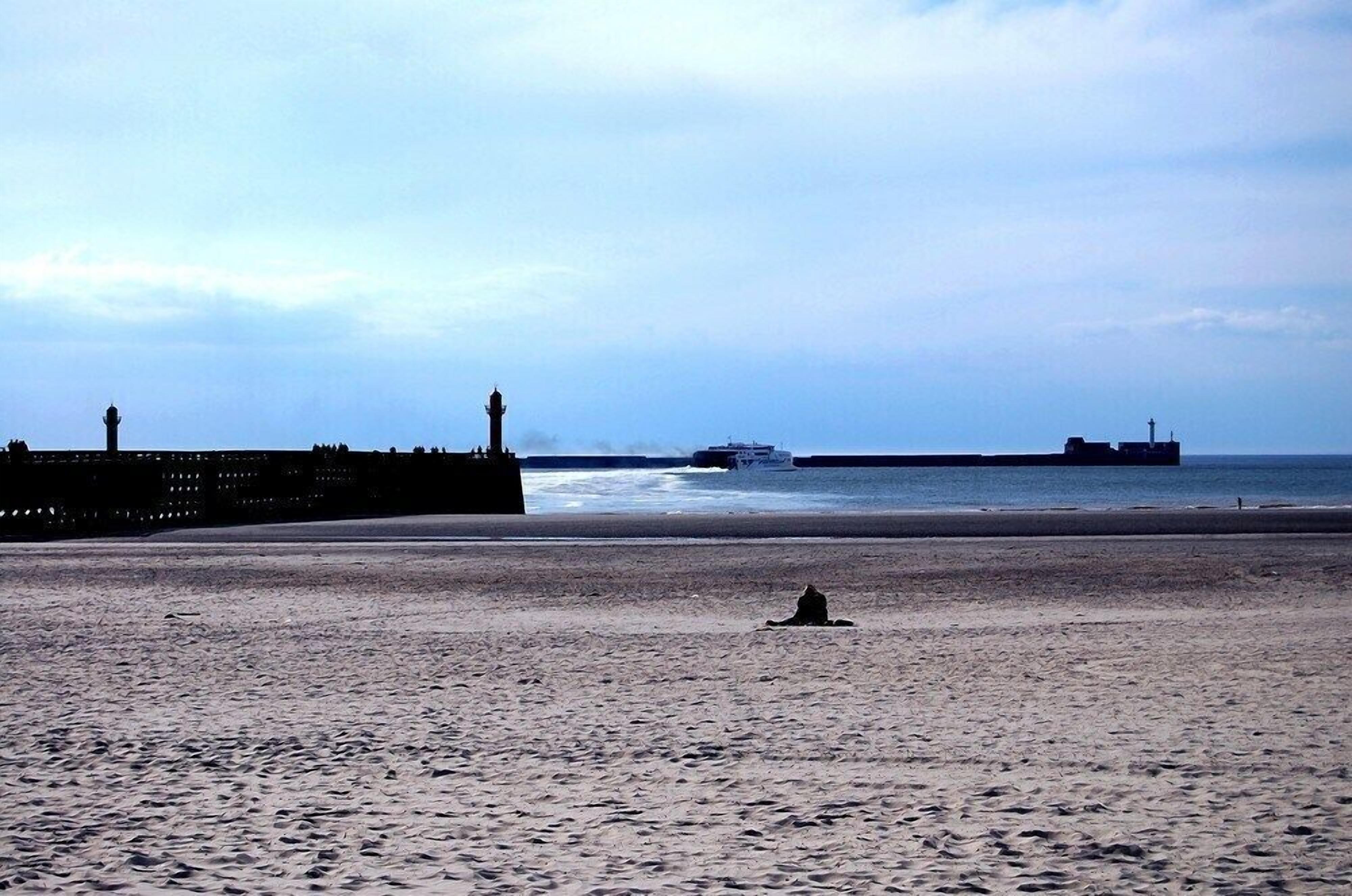 On the beach, sun-loungers, beach towels