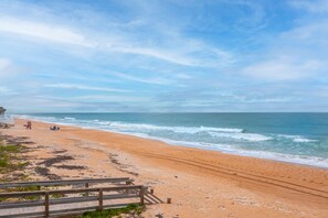 On the beach, sun-loungers, beach towels