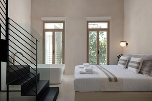 Suite junior | 1 dormitorio, ropa de cama de alta calidad, edredones de plumas