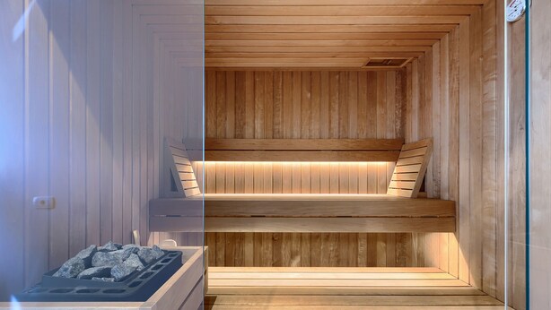 A sauna with wooden benches and a heated floor. - Charming Villa nestled in a region renowned for its exceptional wineries.  (Triban)
