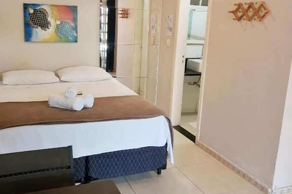 Habitación Confort | Ropa de cama de alta calidad y colchones con acolchado adicional