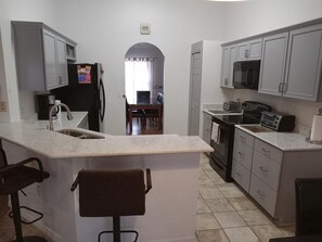 Private kitchen - Our 4 Bedroom Home is priced right for your Orlando Dream Vacation, book it now! (Kissimmee)