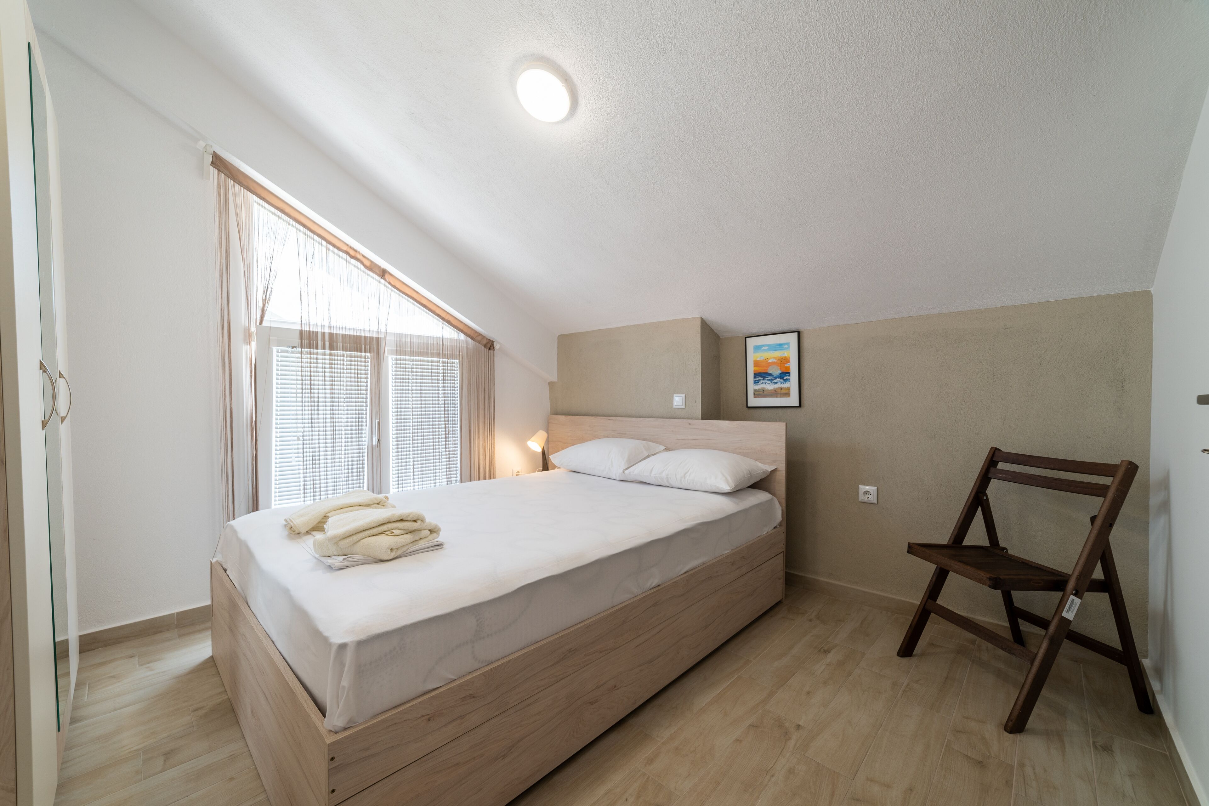 2 bedrooms, blackout curtains, iron/ironing board, free WiFi