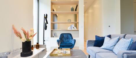 Studio Apartment | Living area | Flat-screen TV, heated floors