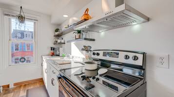 Fridge, microwave, stovetop, coffee/tea maker