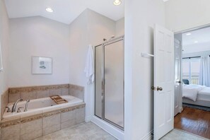 Shower, hair dryer, towels, shampoo