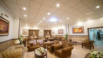 Business Double or Twin Room | Living area | 42-inch LED TV with cable channels