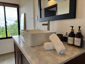 Hair dryer, towels, soap, shampoo