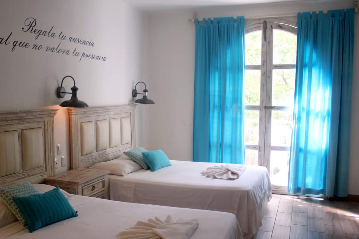 Minibar, in-room safe, iron/ironing board (on request), free WiFi