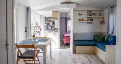 Mobilheim 'Au Petit Bonheur' mit Gemeinschaftspool, privater Terrasse und eigenem Garten