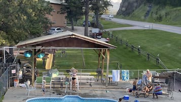 Seasonal outdoor pool, pool loungers