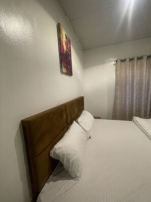 1 多间卧室、客房内保险箱、免费 WiFi、床单