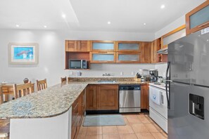 Fridge, microwave, oven, stovetop - Oceanview Condo Walking distance to Beach Sleeps 6 (Coco)