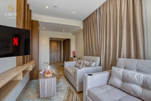 Suite estudio Grand | Edredones de plumas, colchones con acolchado adicional, minibar