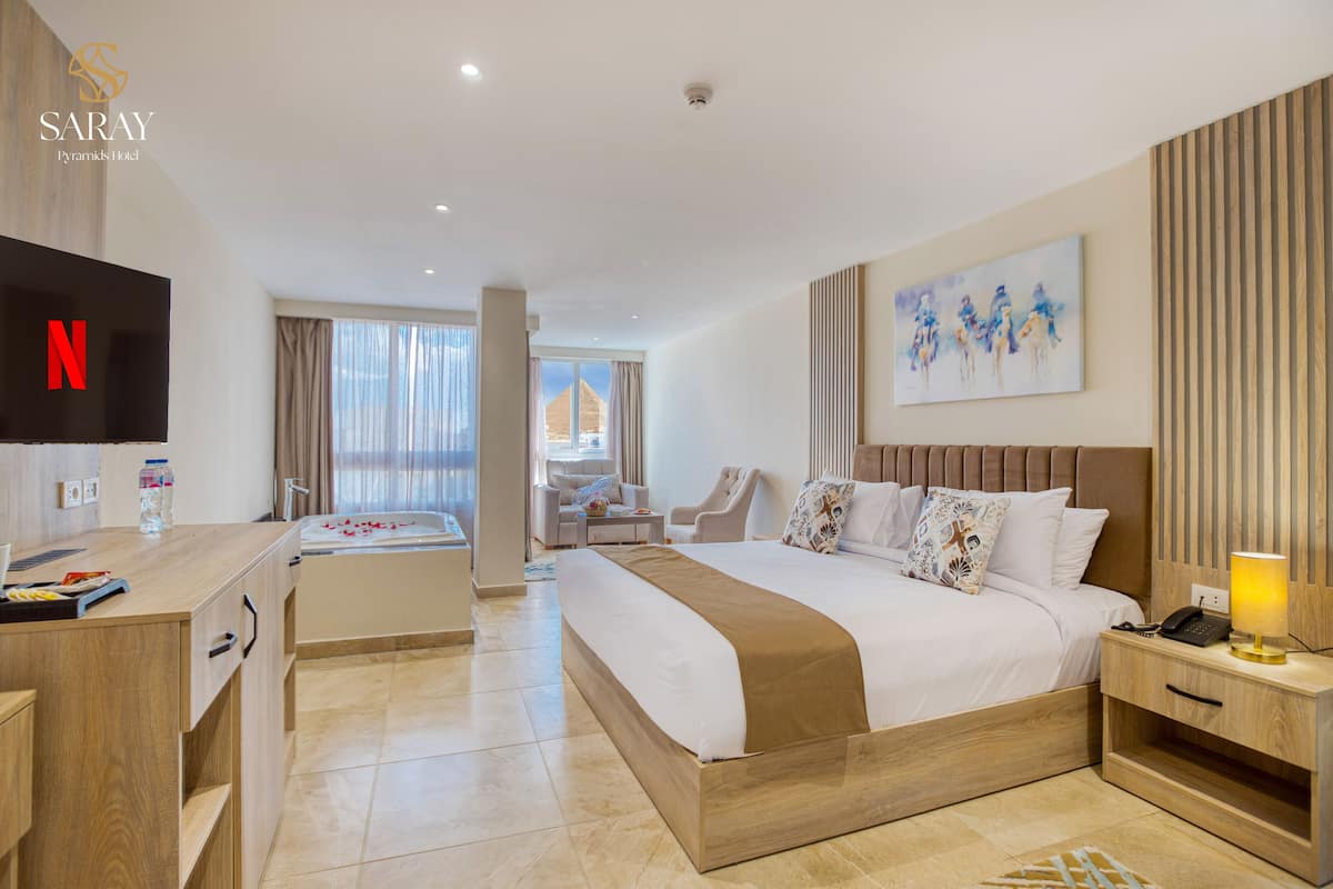 Luxury Suite with Jacuzzi & Pyramids View | Down comforters, pillowtop beds, minibar, in-room safe