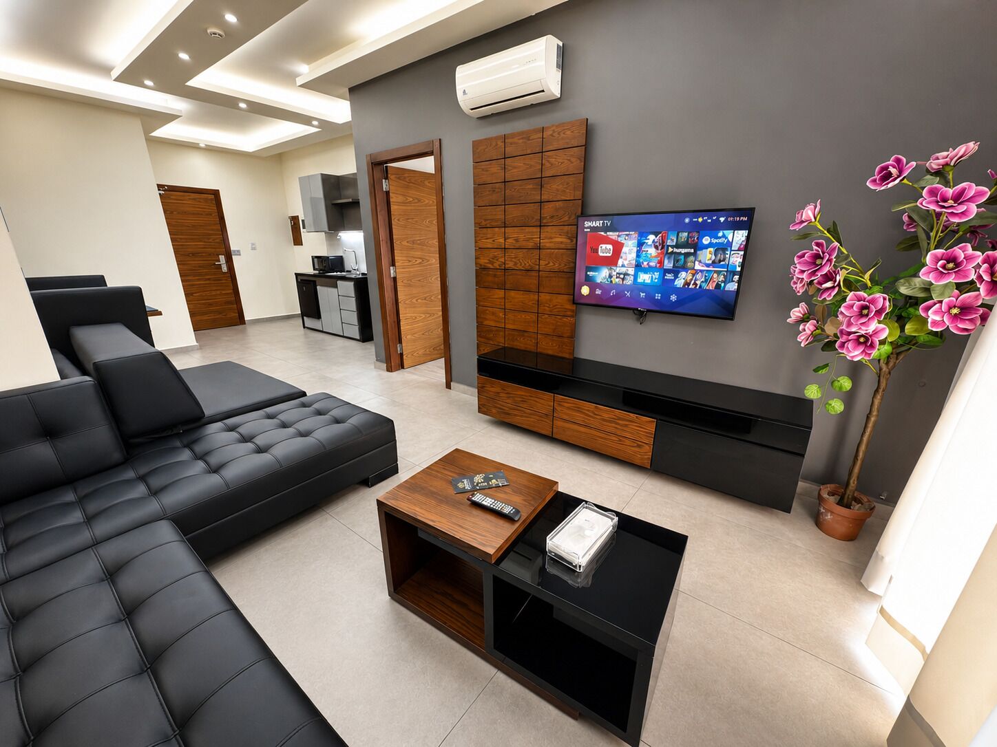 Junior Suite, Multiple Beds, Balcony, City View | Living area | 45-inch Smart TV with digital channels
