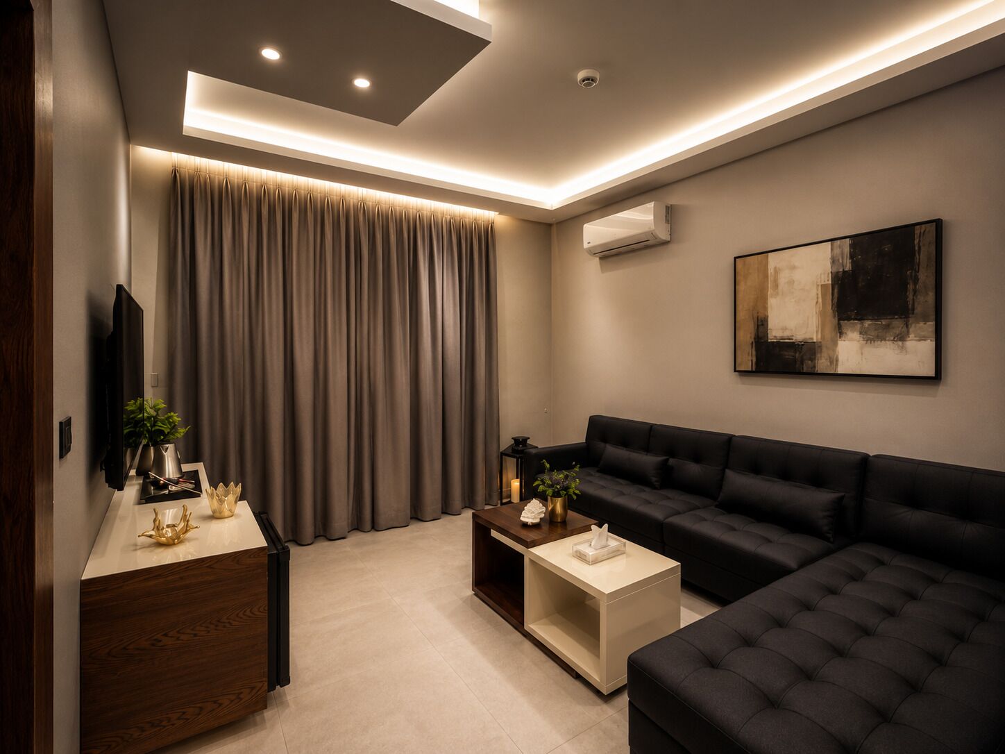 Suite junior, 1 cama matrimonial | Área de sala de estar | Smart TV de 45 pulgadas con canales digitales 