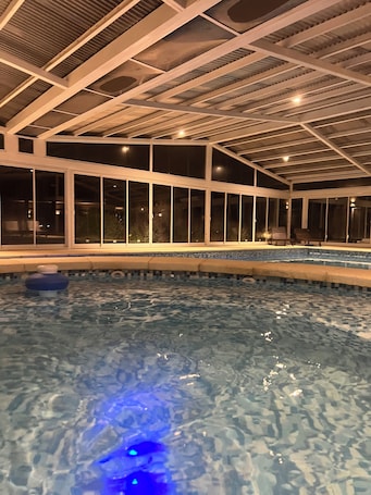 2 indoor pools, open 10:00 AM to 8:00 PM, pool umbrellas
