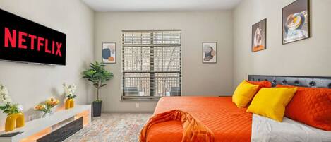 1 bedroom, desk, iron/ironing board, travel crib