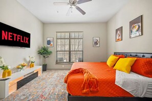 1 bedroom, desk, iron/ironing board, travel crib