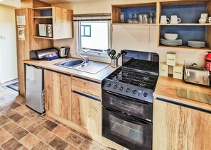 Refrigerador, horno, parrilla de estufa y tostadora 