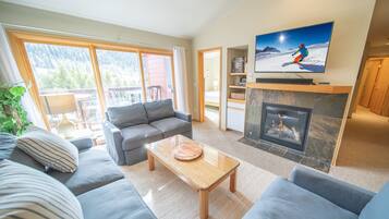 Signature Condo, 3 Bedrooms, Balcony, Mountain View (Cinnamon Ridge D323) | Living area | Smart TV, fireplace