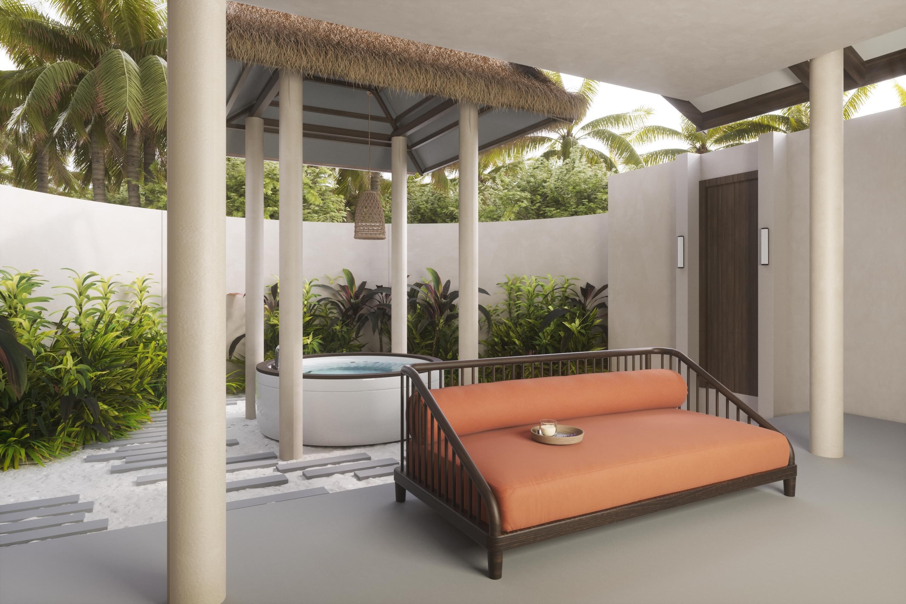 A modern outdoor seating area with a cushioned bench, a hot tub, and a thatched roof structure.